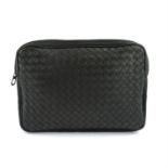 BOTTEGA VENETA - a black leather pouch.