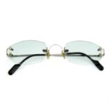 CARTIER - a pair of prescription sunglasses.