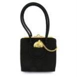 ANYA HINDMARCH - a black fabric handbag.
