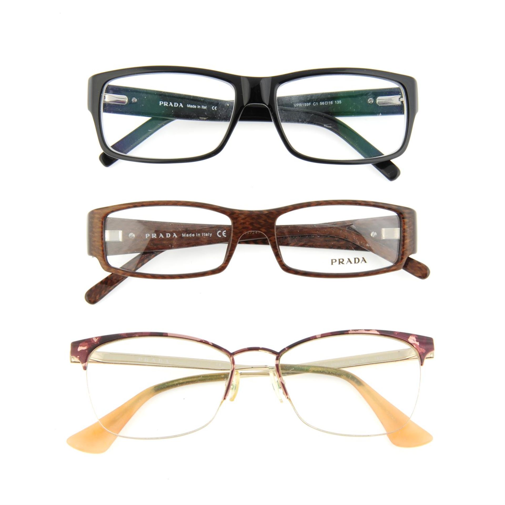 PRADA - three pairs of prescription glasses.