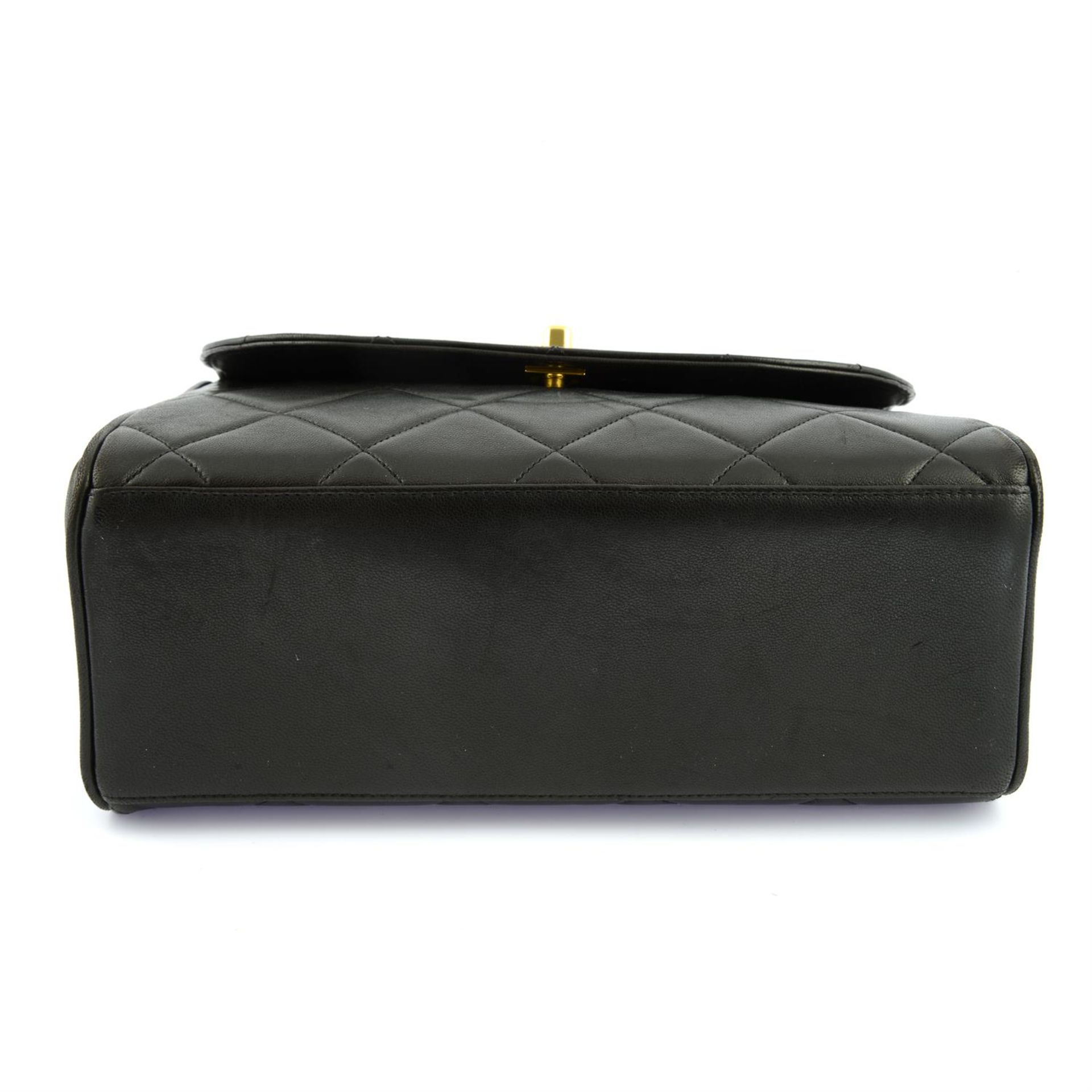 CHANEL - a black lambskin leather top handle single flap handbag. - Image 4 of 5