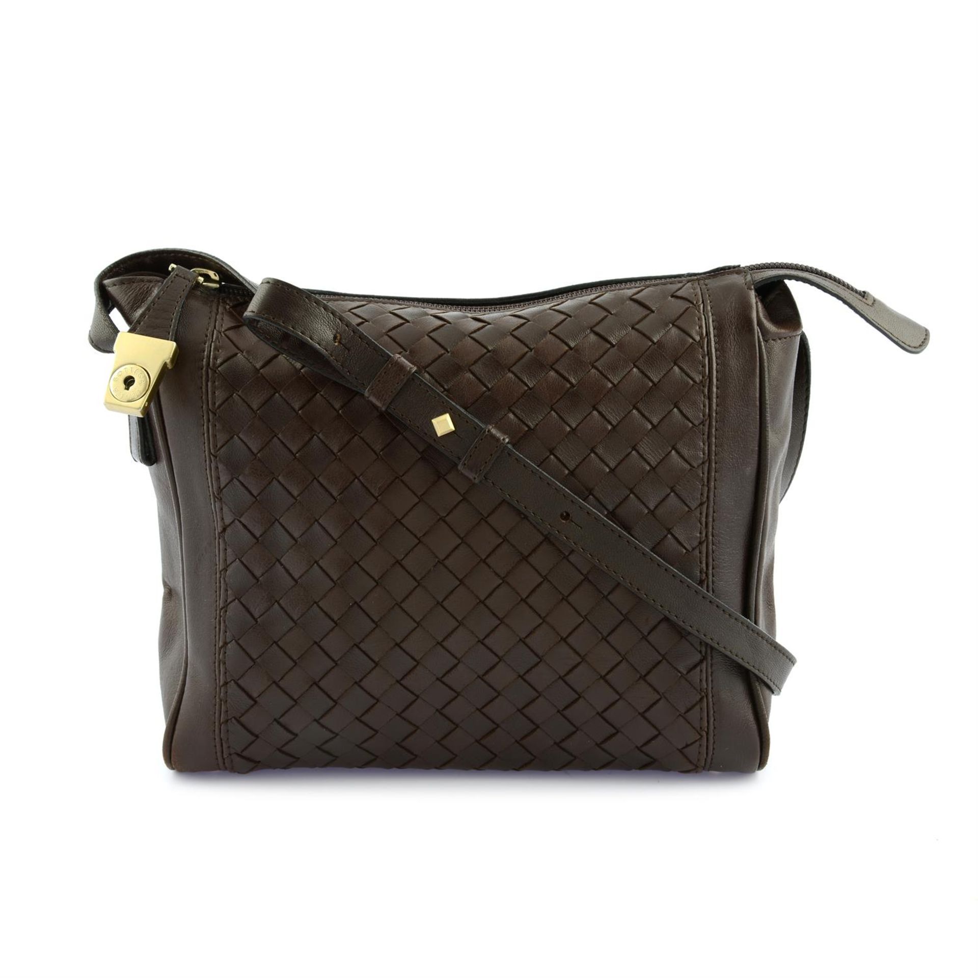 BOTTEGA VENETA - a brown leather crossbody handbag.