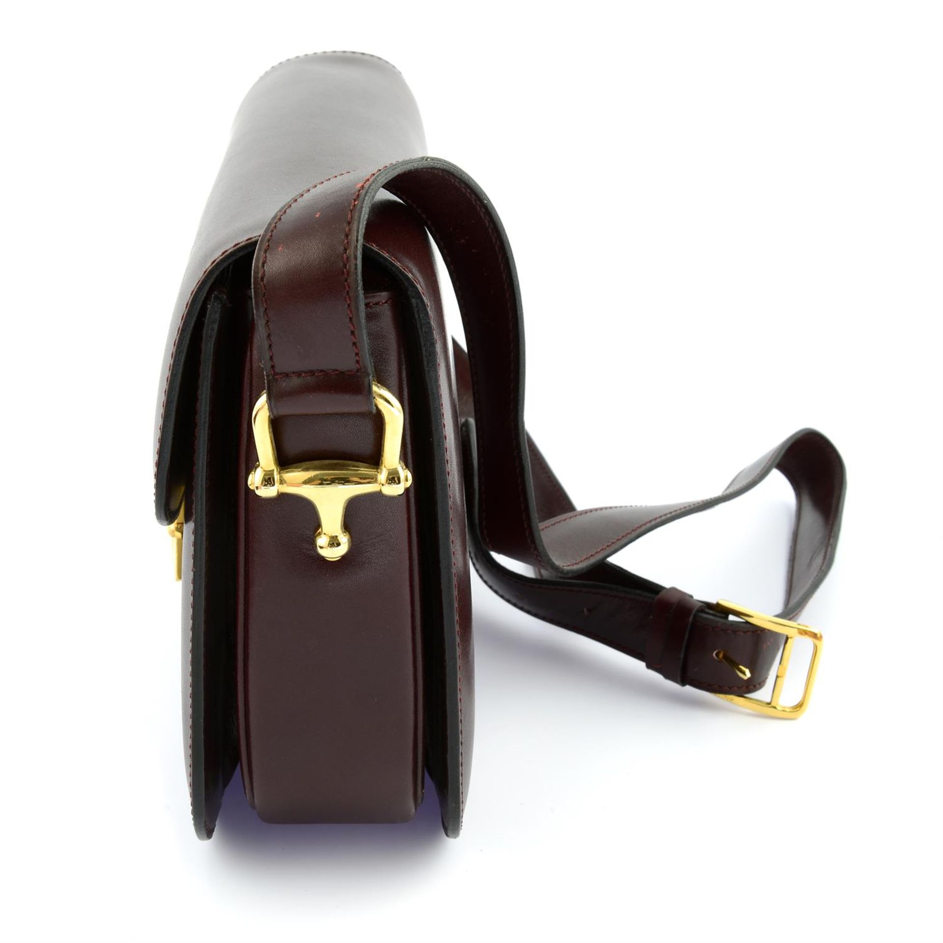 CÉLINE - a burgundy leather shoulder bag and matching leather gloves. - Bild 6 aus 8