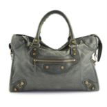 BALENCIAGA - a grey leather city handbag.