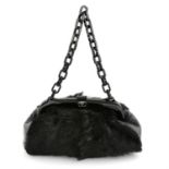CHANEL - a black goat hair frame bag.