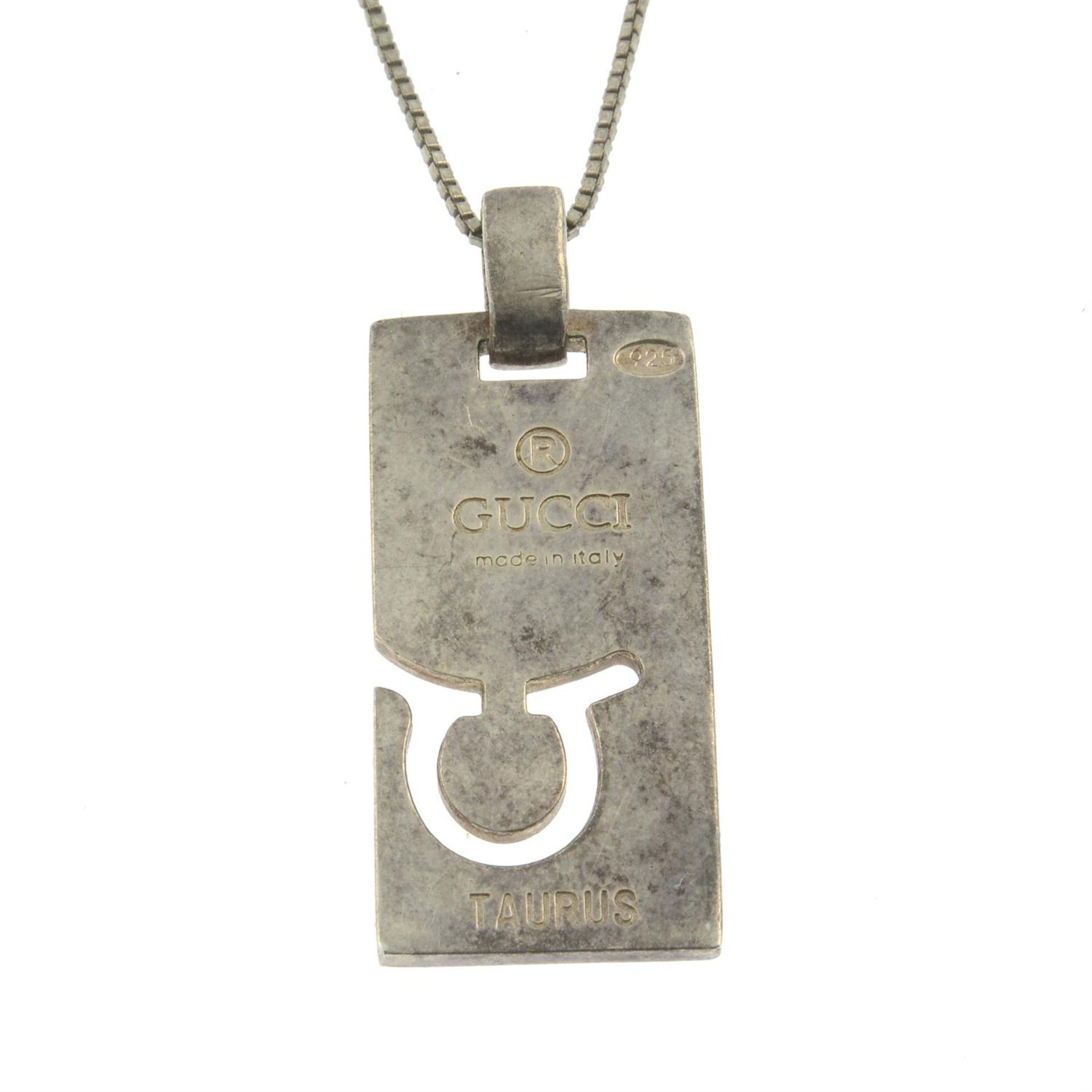GUCCI - a Taurus pendant, with non-designer chain.