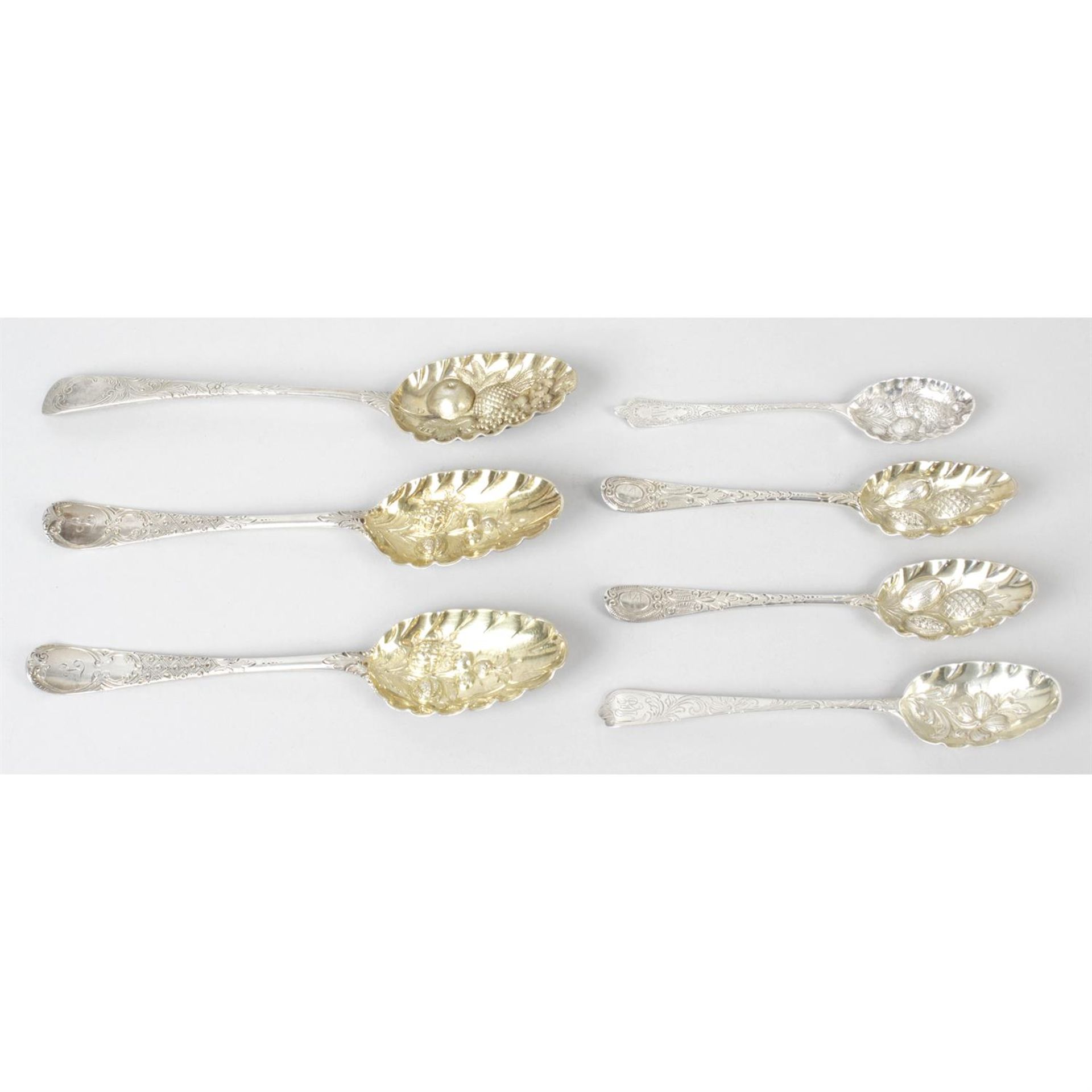A selection of seven early Georgian & later 'berry spoons', comprising three table spoons & four