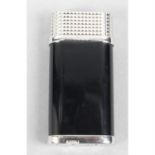 A Cartier 'Clous de Paris' cigarette lighter.