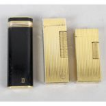 A selection of assorted lighters, to include Dupont, Cartier and Dunhill examples. (5)