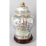 A reproduction Cantonese porcelain vase and cover, a Limoges porcelain vase and cover,