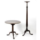 A 19th century oak circular topped snap top table, together with a mahogany torchere.
