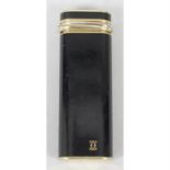 A Cartier cigarette lighter.