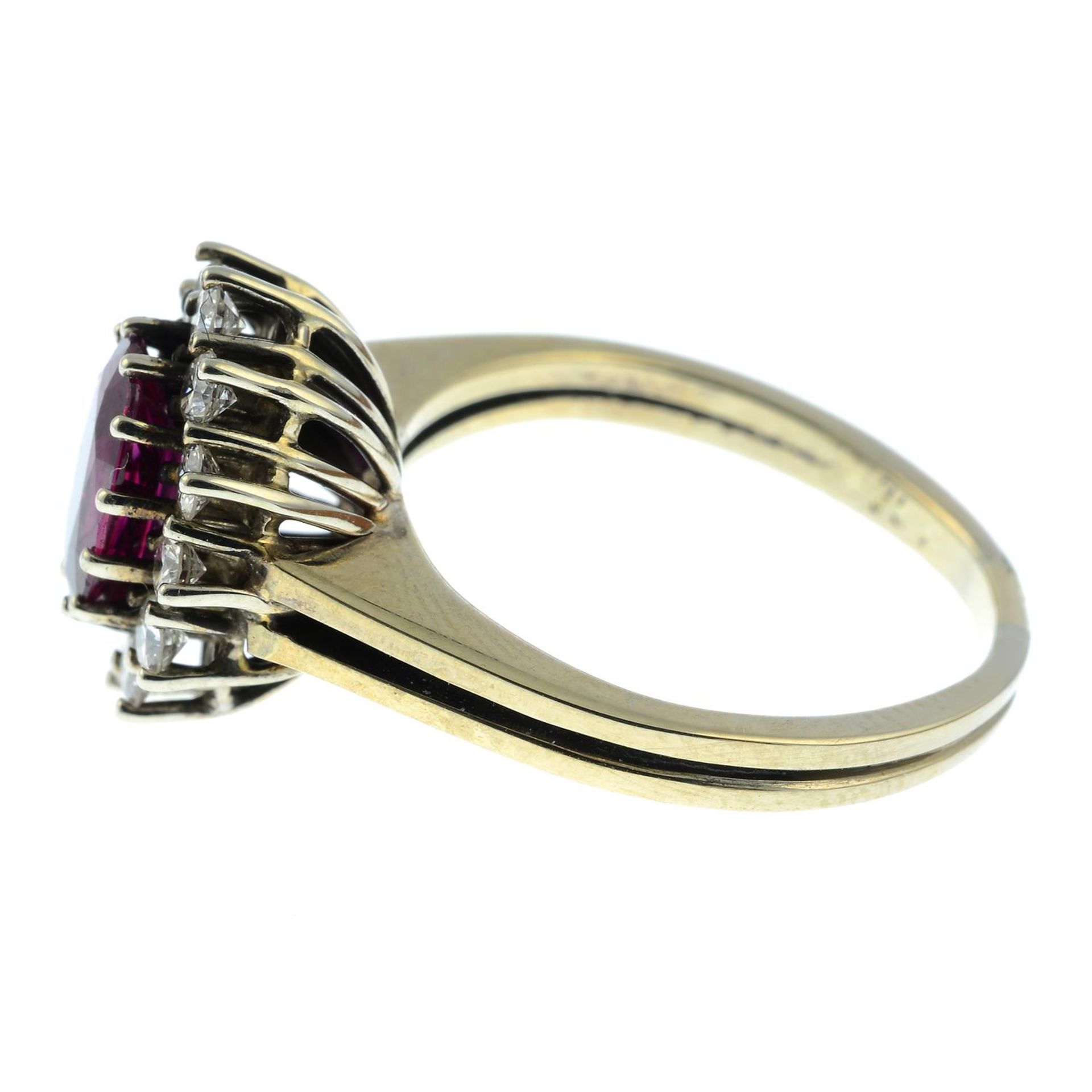 A ruby and brilliant-cut diamond cluster ring. - Image 3 of 5