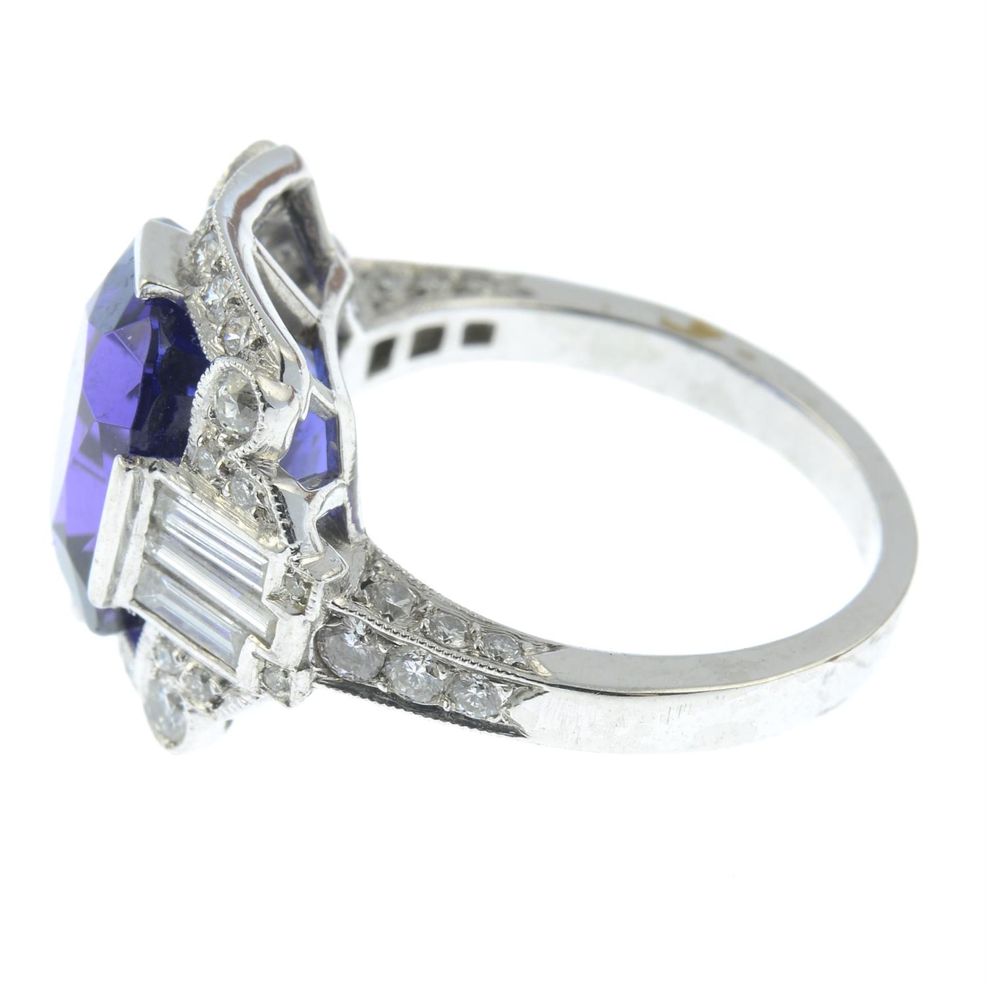 A tanzanite dress ring, with baguette and brilliant-cut diamond surround. - Image 3 of 5
