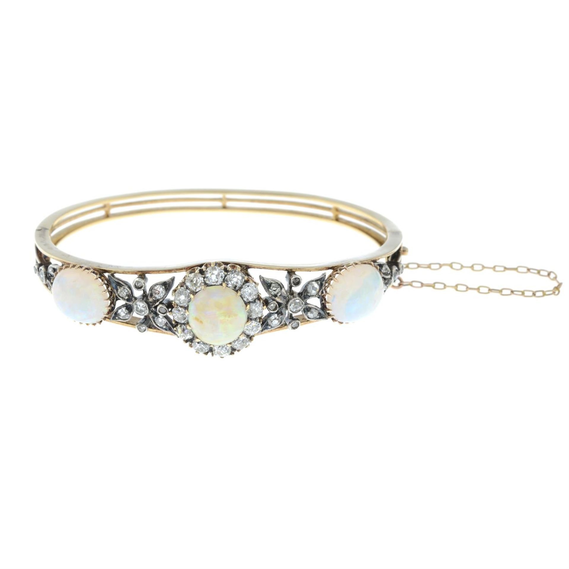 A late 19th century silver and gold opal and old-cut diamond floral cluster hinged bangle. - Image 2 of 3