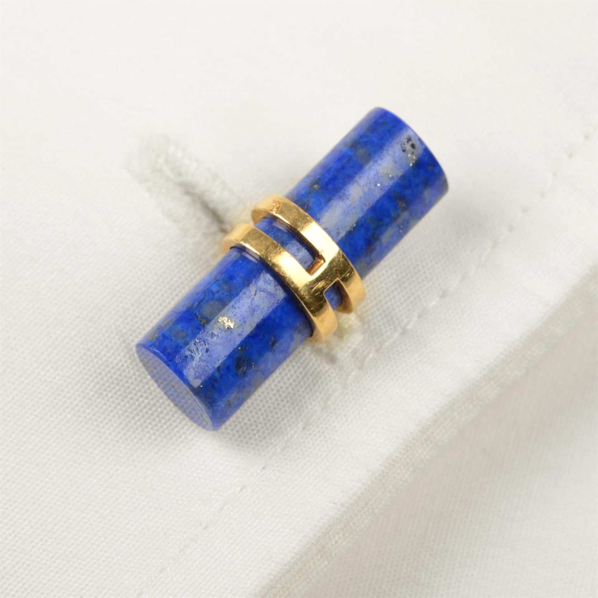 A pair of lapis lazuli cufflinks, by Hermès.