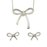 A bow necklace and earring suite, by Tiffany & Co.