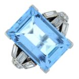 An aquamarine and vari-cut diamond ring.