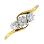 An early 20th century 18ct gold old-cut diamond three-stone ring.