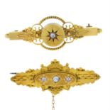 Two 15ct gold diamond brooches.