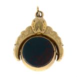 A late Victorian 9ct gold ornate framed bloodstone and carnelian swivel fob.