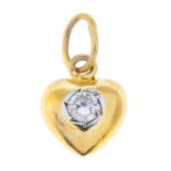 A heart-shape pendant, with brilliant-cut diamond highlight.