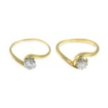 Two 18ct gold diamond crossover rings.