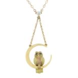 An early 20th century 9ct gold bi-colour owl drop pendant, on an integral trace-link chain,