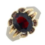 A 9ct gold red gem single-stone ring.
