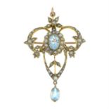 A late 19th century 9ct gold aquamarine and split pearl openwork pendant.