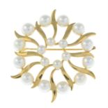A cultured pearl stylised flower brooch, by Mikimoto.