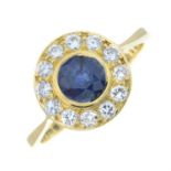 An 18ct gold sapphire and diamond cluster ring.