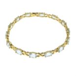 A 9ct gold aquamarine line bracelet.