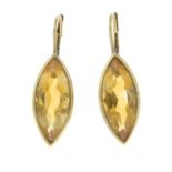 A pair of citrine earrings.