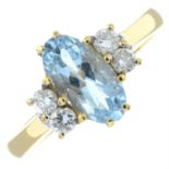 An 18ct gold aquamarine and diamond dress ring.