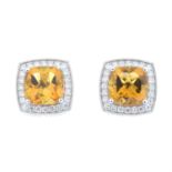 A pair of 18ct gold citrine and diamond cluster earrings.