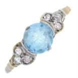 An old-cut diamond and blue zircon ring.