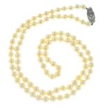 A cultured pearl single-strand necklace, with diamond push-piece clasp.