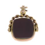 An early 20th century 9ct gold carnelian and bloodstone swivel fob.