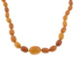 An amber single-strand necklace, with push-piece clasp.