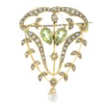 An early 20th century 9ct gold peridot and split pearl openwork pendant, suspending a cultured