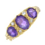 An 18ct gold amethyst and diamond dress ring.