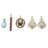 A pair of 9ct gold drop earrings and three gem-set pendants.