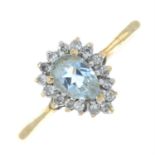 A 9ct gold aquamarine and diamond cluster ring.
