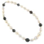 A grey and white baroque cultured pearl necklace.