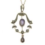 An early 20th century 9ct gold amethyst and split pearl pendant, with trace-link chain.
