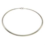 A neck ring, by Vivianna Torun, for Georg Jensen.