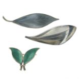 Three early to mid 20th century Scandinavian silver and enamel leaf brooches, two by David Andersen.