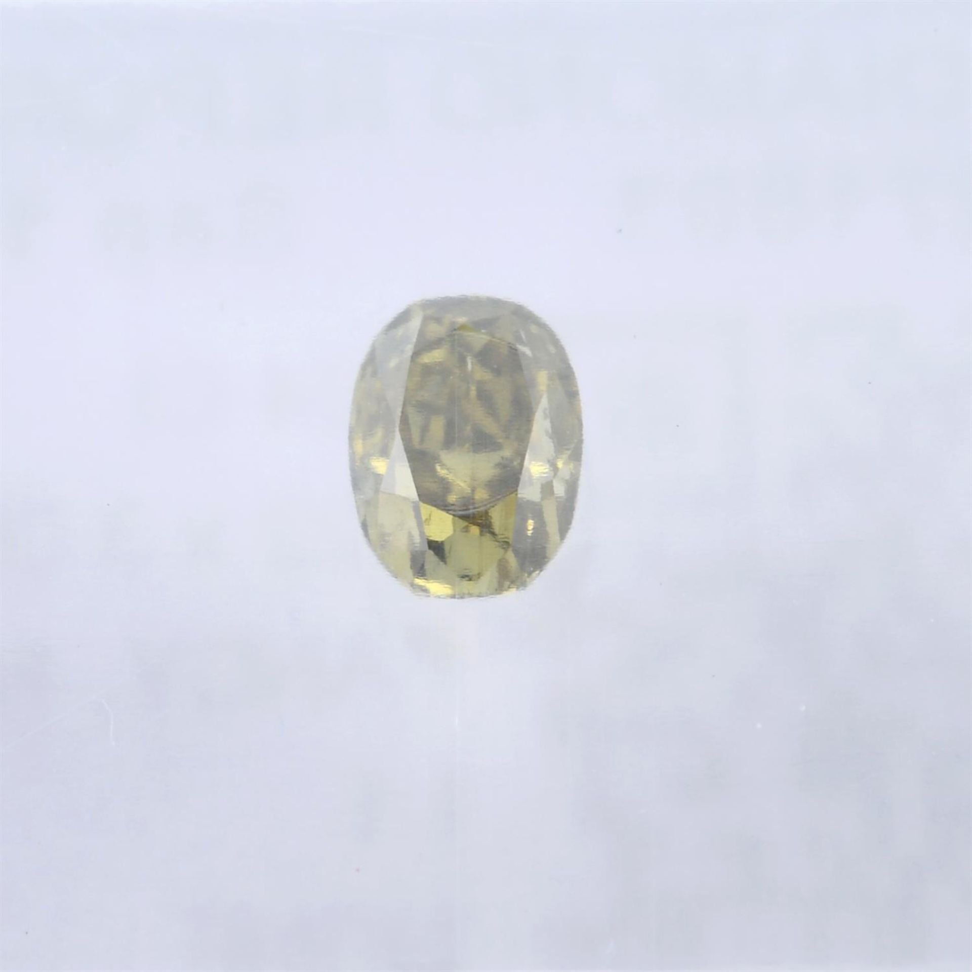 An oval shape fancy intense greenish brownish yellow diamond, weighing 0.24ct. Within IGI security - Image 2 of 4