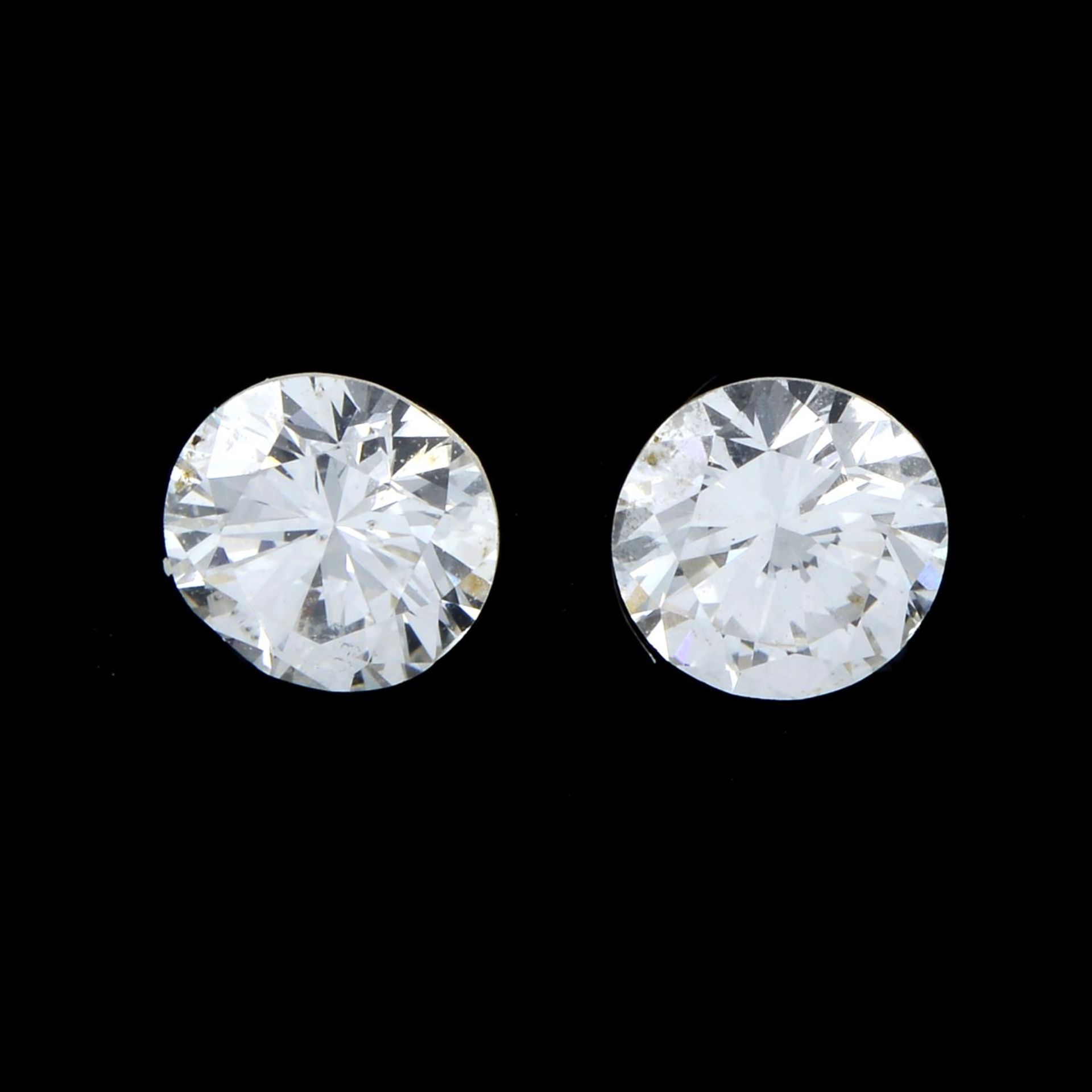 Pair of brilliant cut diamonds weighing 0.66ct. Diamonds estimated to be H colour and VS2 clarity.